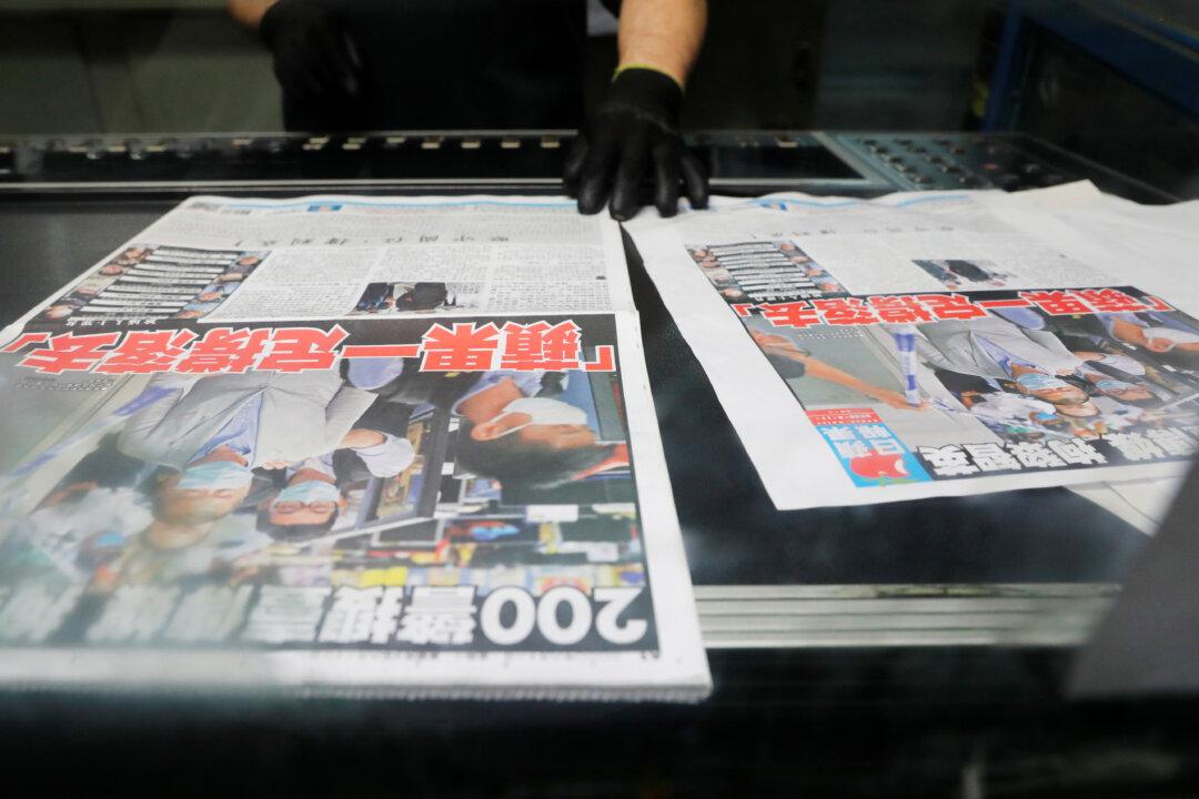 Hong Kong’s Apple Daily Vows to Fight On After Owner Arrested