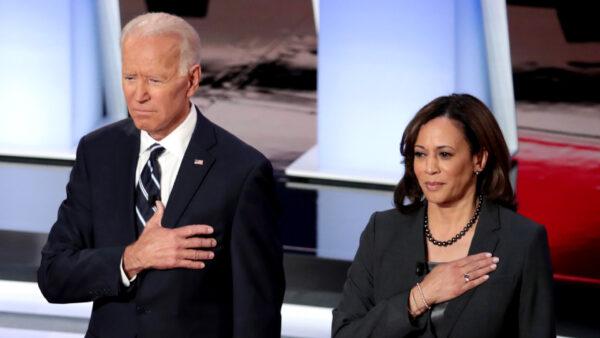 Former Vice President Joe Biden (L) and Sen. Kamala Harris (D-Calif.) take the stage at the Democratic Presidential Debate at the Fox Theatre in Detroit, Mich., on July 31, 2019. (Scott Olson/Getty Images)