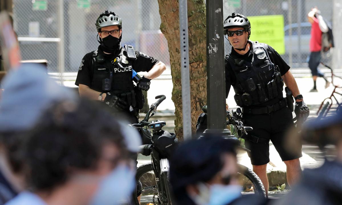 18 Arrested After Rioting in Seattle, Six Officers Injured