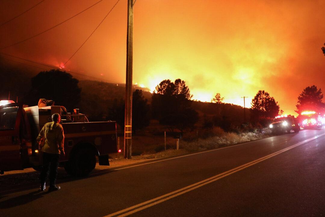 California Firefighters Save American Flag From Burning Property Amid Devastating Lake Fire