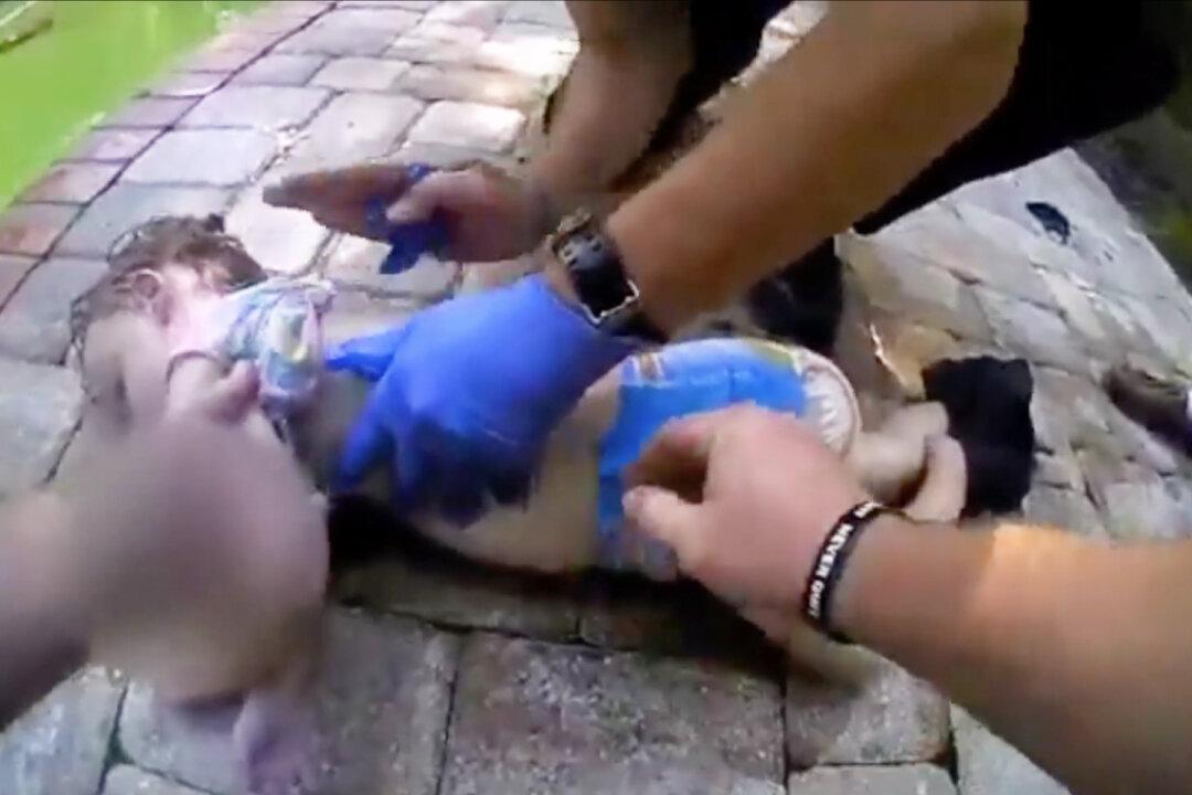 Bodycam Shows Nerve-Grinding Footage of Officers Rescuing 3-Year-Old Floating in Pool
