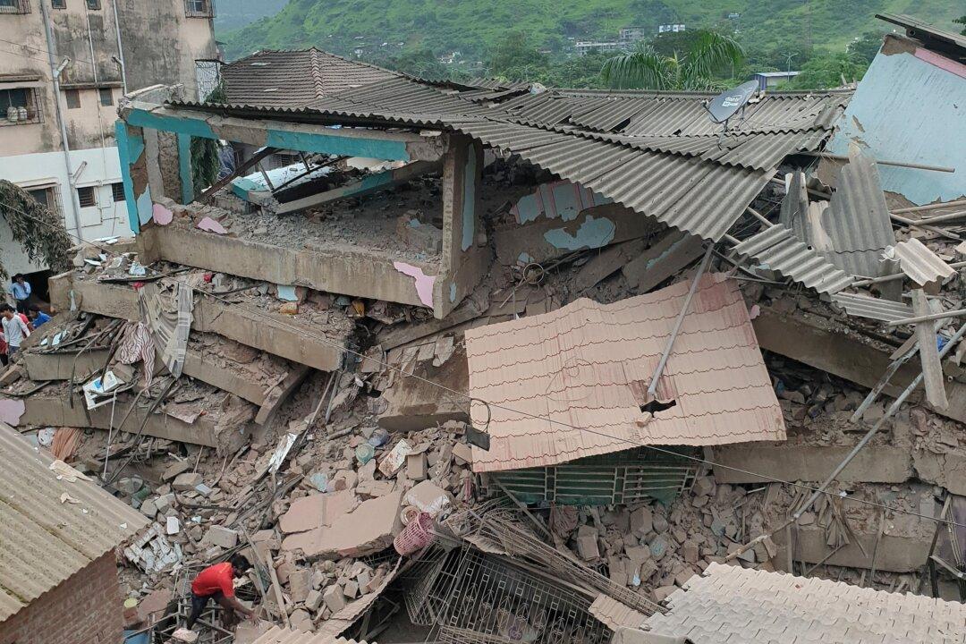 At Least 90 Feared Trapped in Building Collapse South of Mumbai