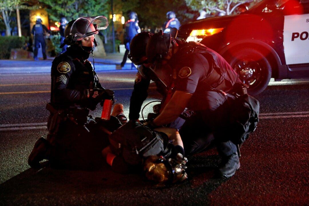 23 Arrested During Riot Outside Portland Police Precinct