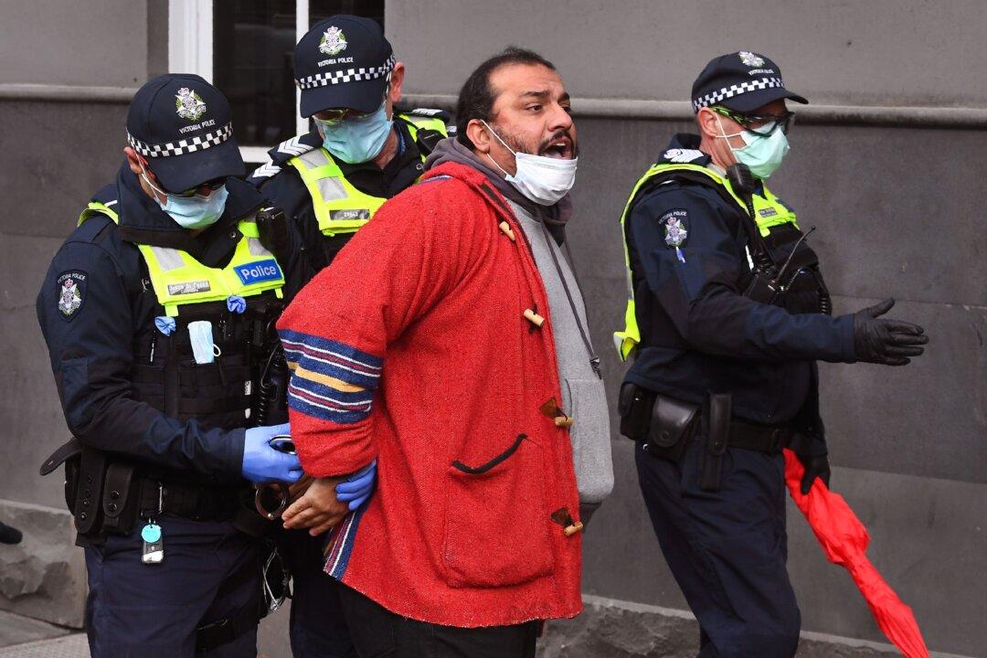Victoria Police Arrest Four People At Melbourne Protest Against CCP Virus Lockdown