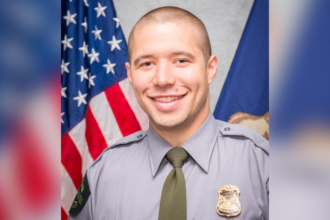 Off-Duty Conservation Officer Pulls Trapped Disabled Woman Out of Burning Mobile Home