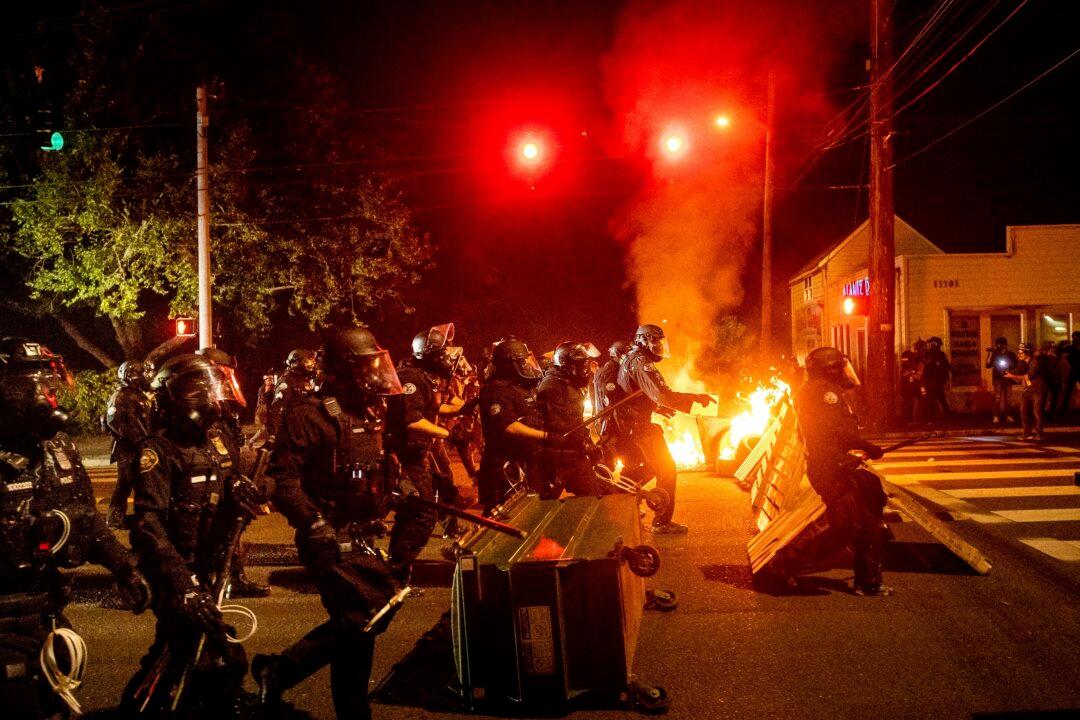 Staffer for Top Oregon Democrat Arrested During Riot in Portland