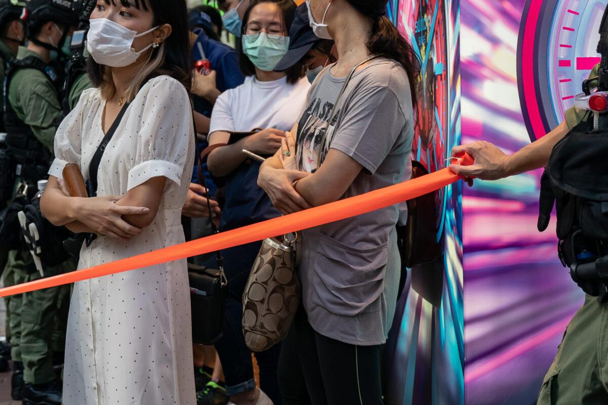 Riot police detain a group of people during a anti-government protest in Hong Kong, on Sept. 6, 2020. (Anthony Kwan/Getty Images)