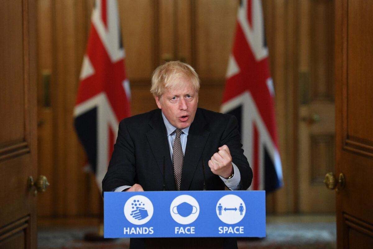To announce that from Sept. 14, people in England will only be allowed to socialise in groups of six or less, Prime Minister Boris Johnson attends a virtual press conference at Downing Street in London on September 9, 2020. (Stefan Rousseau-WPA Pool/Getty Images)
