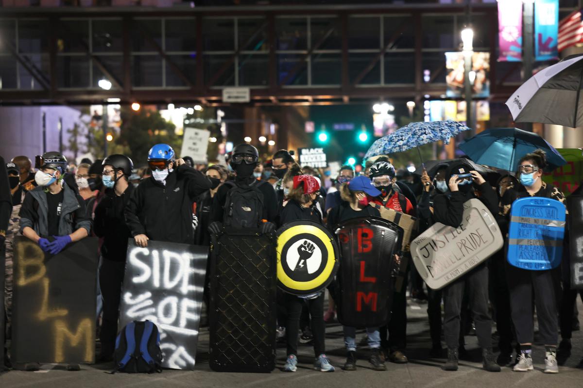 2 Men Charged for Attacking Police Officers During Rochester Riot