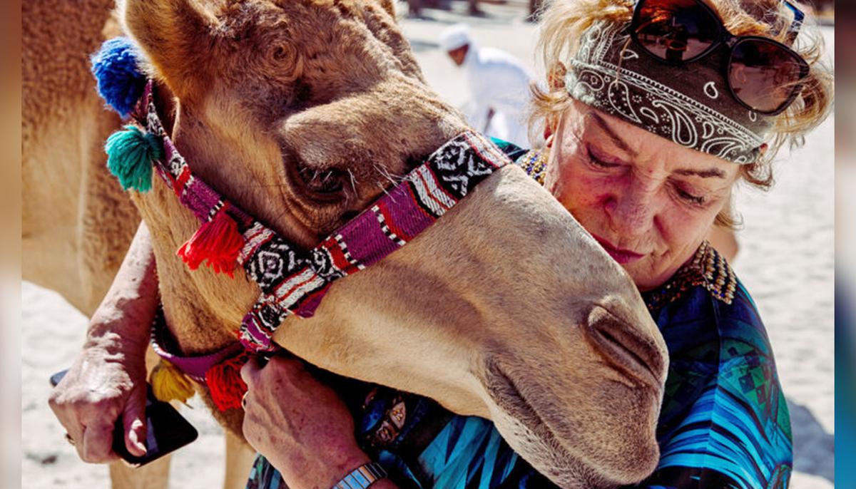 Elderly German Woman Lives Off-Grid With 40 Camels in a Desert Farm in Dubai