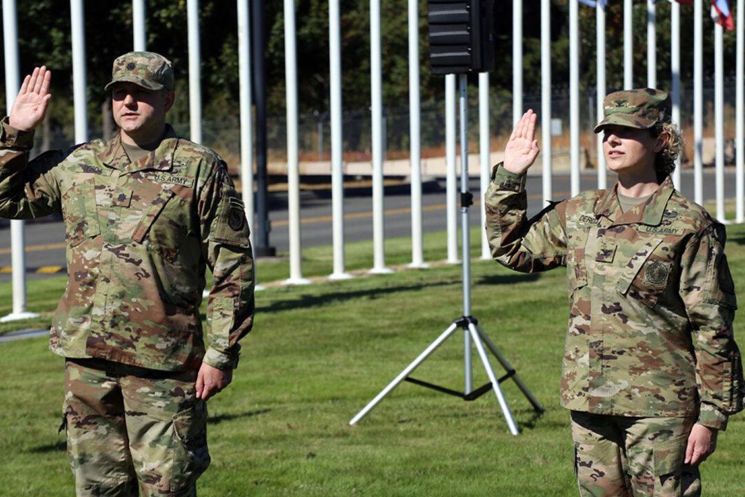 National Guard Couple With 3 Kids Celebrate Their Promotions on the Same Day