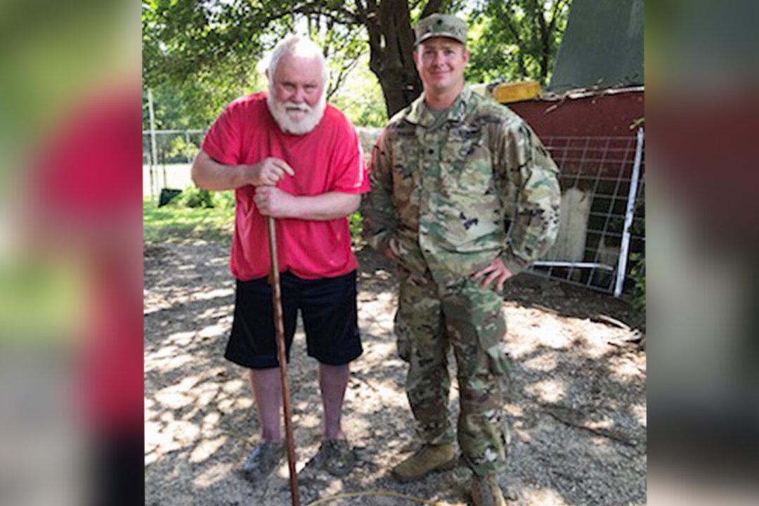 National Guard Soldier Saves SUV Crash Victim Nearly Strangled by Seat Belt