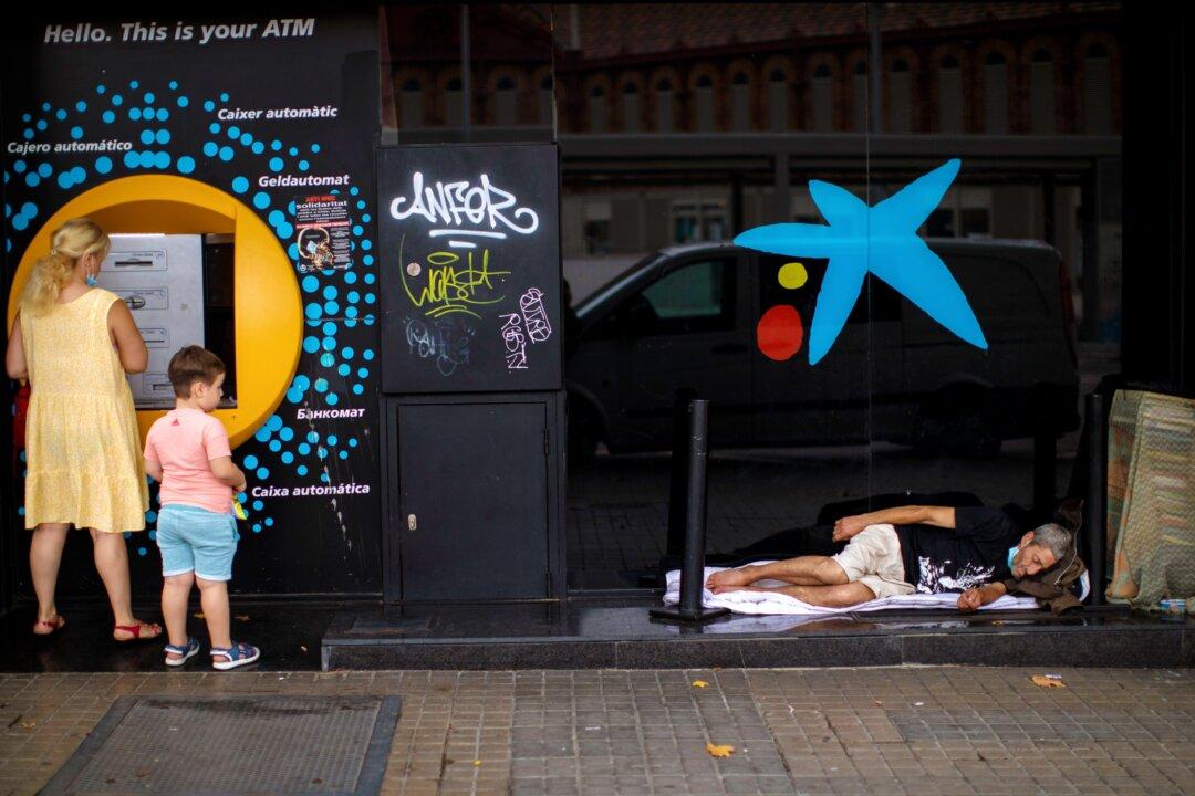 Spanish Banks Merge in Sign of Hard Economic Times Ahead