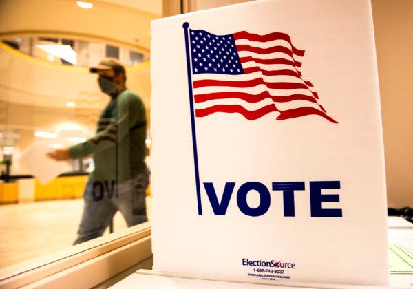 A voter leaves after filling out their ballot at the Beltrami County Administration building in Bemidji, Minn., on Sept. 18, 2020. (Stephen Maturen/Getty Images)