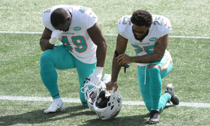 NFL Coach Mike Ditka to Kneeling Players: ‘If You Can’t Respect This Country, Get Out’