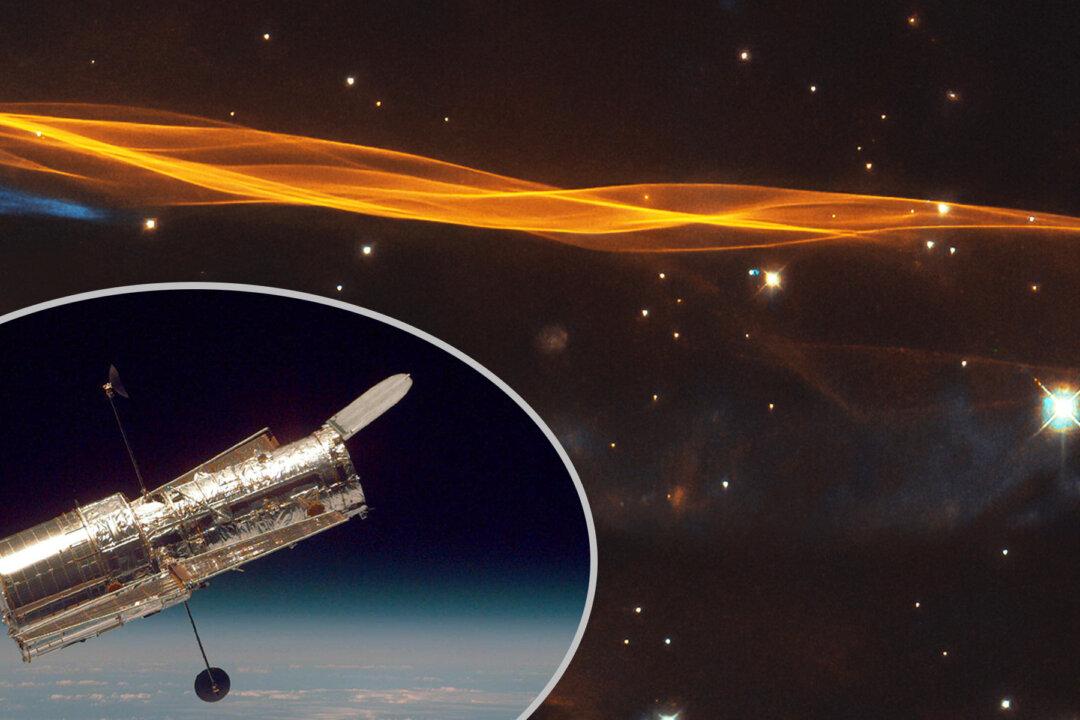Hubble Space Telescope Reveals Spectacular Wake of Supernova Blast Wave 15,000 Years Old