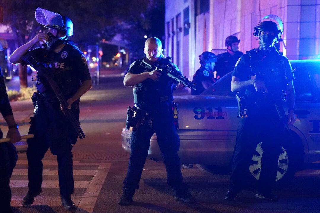 Suspect Identified in Shooting of 2 Louisville Officers Amid Unrest