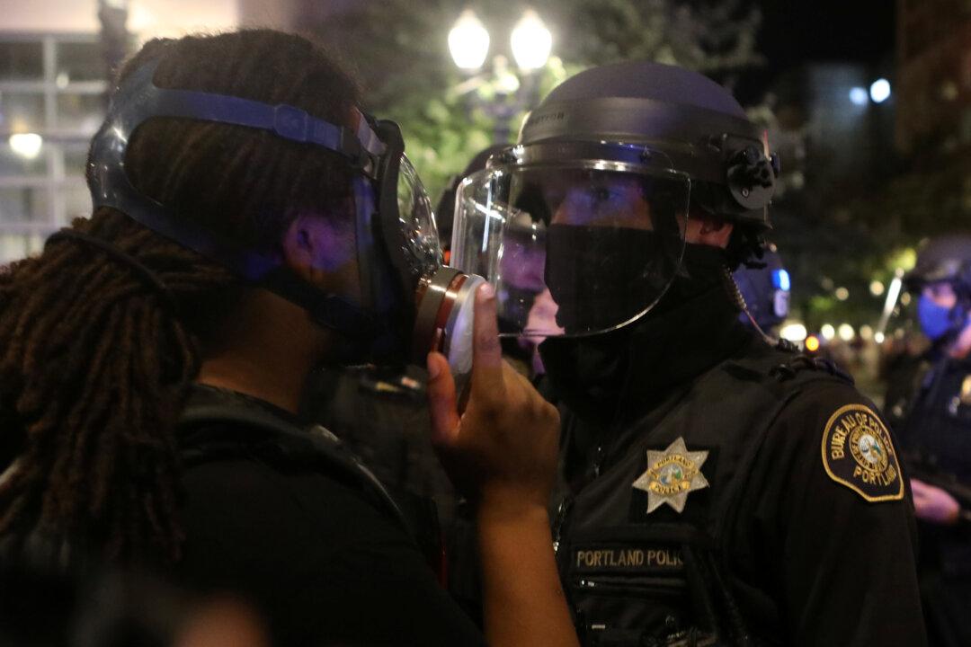 Portland Police Arrest Black Lives Matter Demonstrators Who Blocked Street