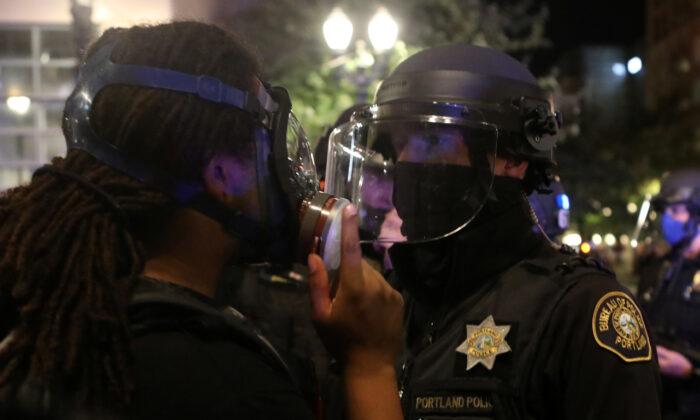 Portland Police Arrest Black Lives Matter Demonstrators Who Blocked Street