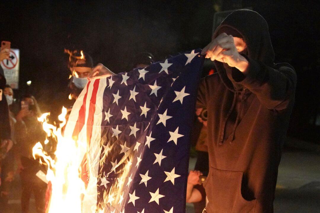 IN-DEPTH: They Escaped Communism, Now They Warn of ‘Total Destruction of America’