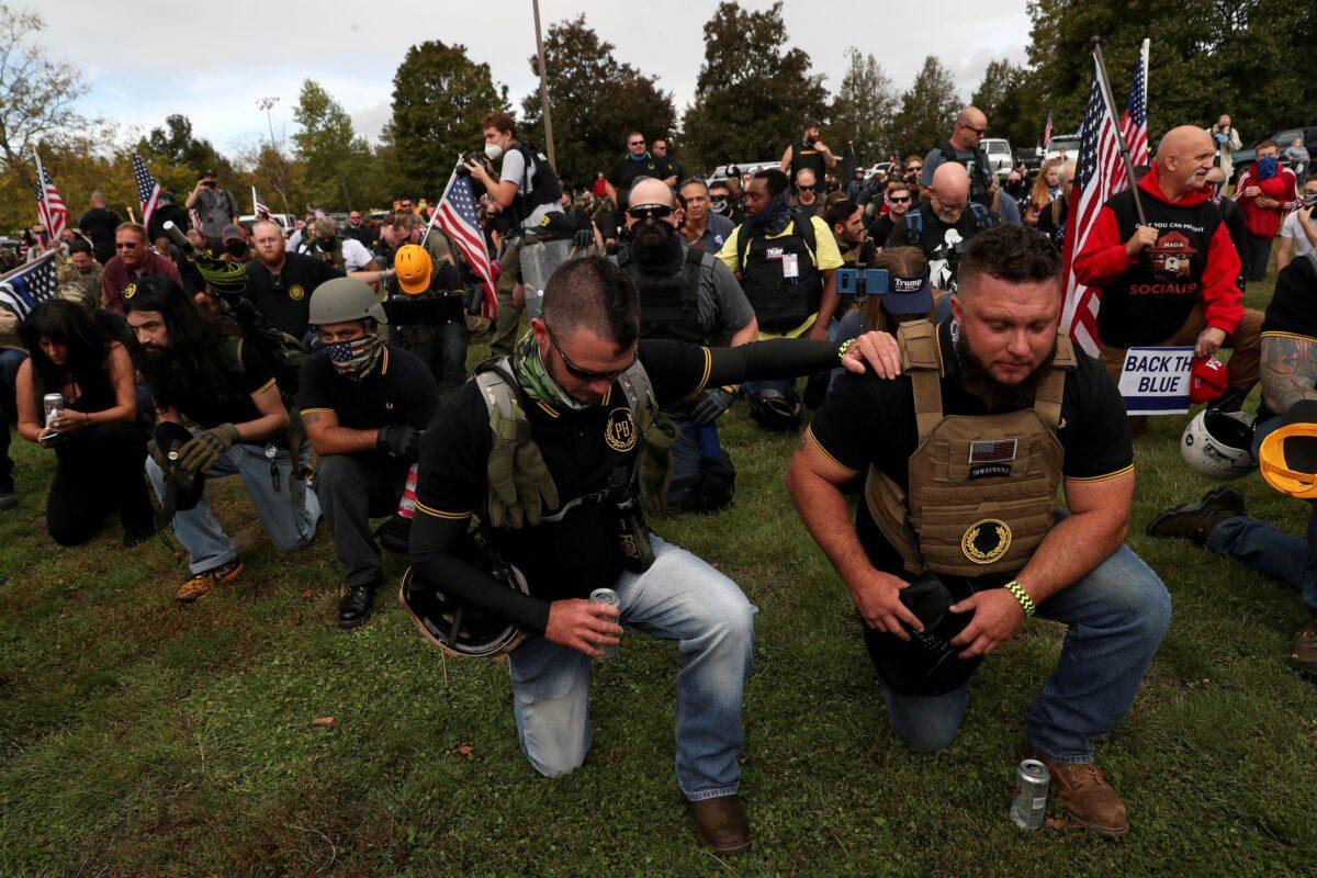 People pray during a Proud Boys rally in Portland, Ore., Sept. 26, 2020. (Leah Millis/Reuters)
