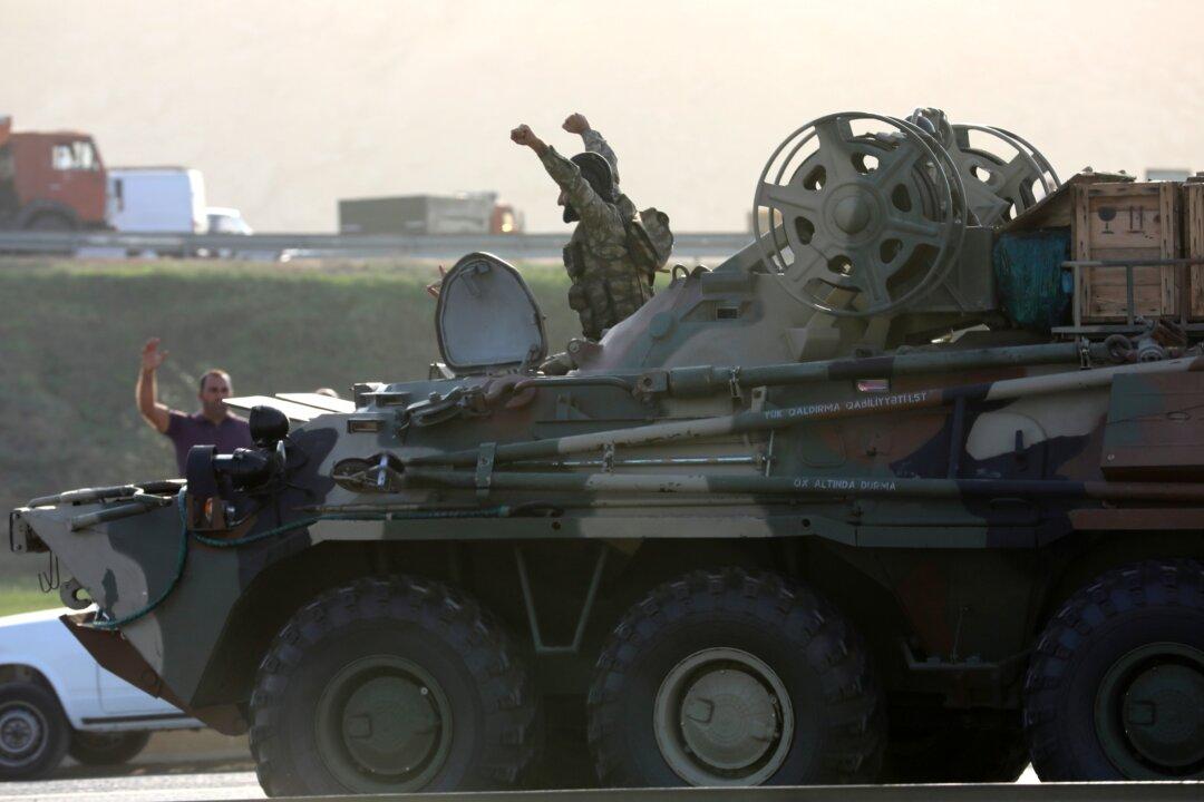 Armenian, Azeri Forces Clash Again, at Least 21 Reported Killed