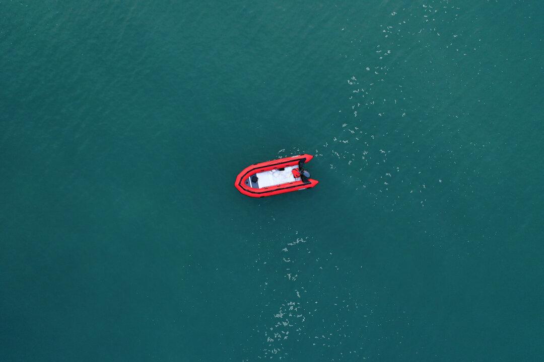 Britain Arrests Three People in International Small Boat Migrant Smuggling Investigation