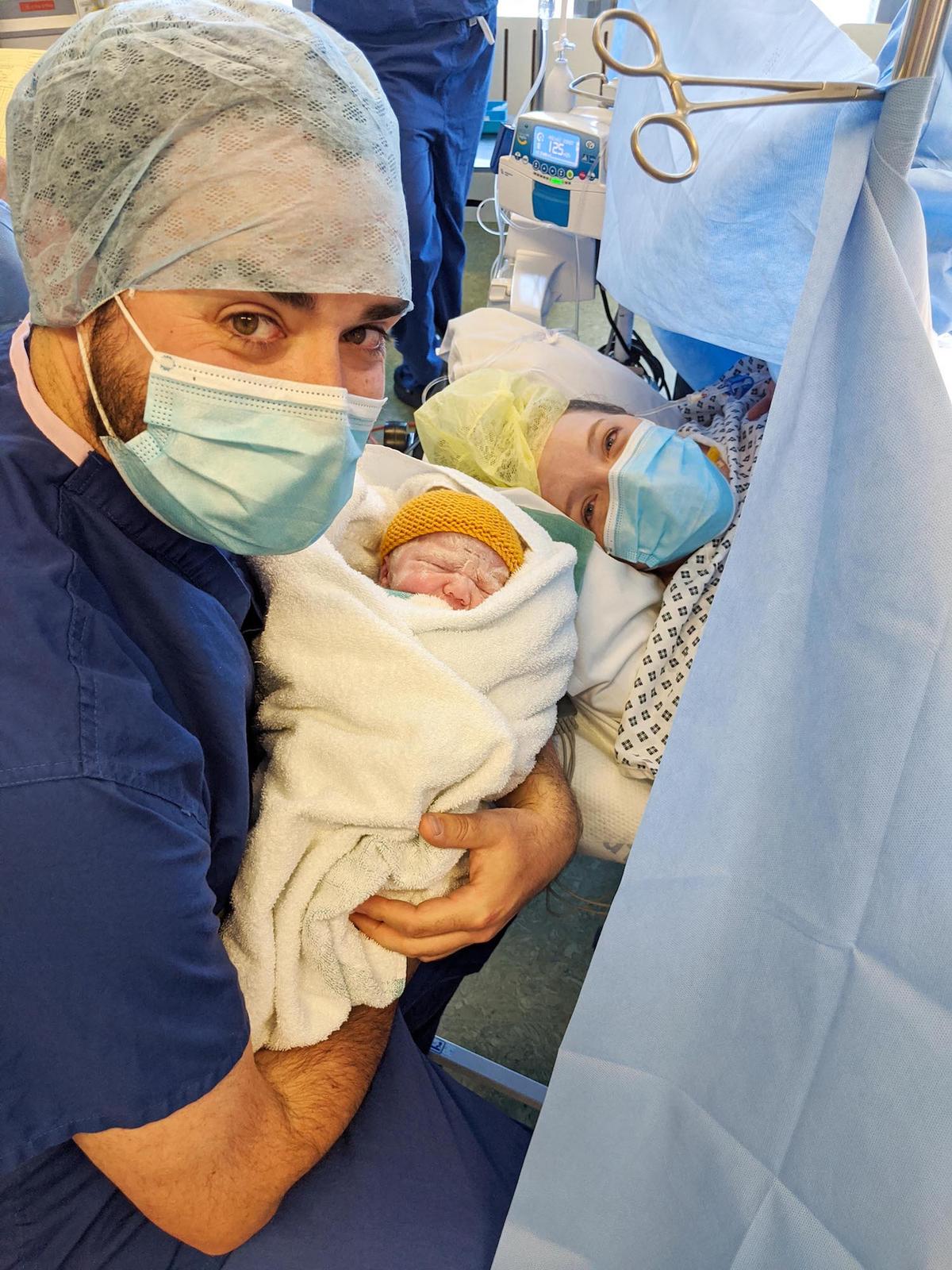 Ali Harris, 34, and her husband, Leigh, 33, holding son Indy. (Caters News)