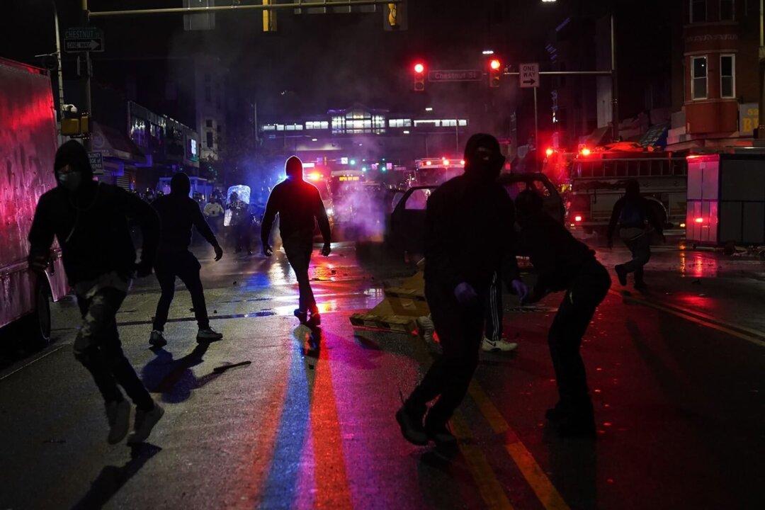 30 Officers Injured During Riots in Philadelphia Following Death of Man Armed With Knife