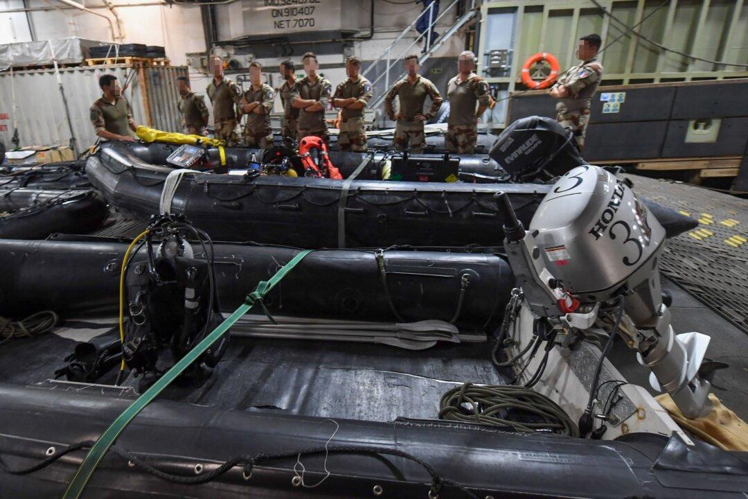 Chinese Man Pleads Guilty in Scheme to Send Military Boats to China