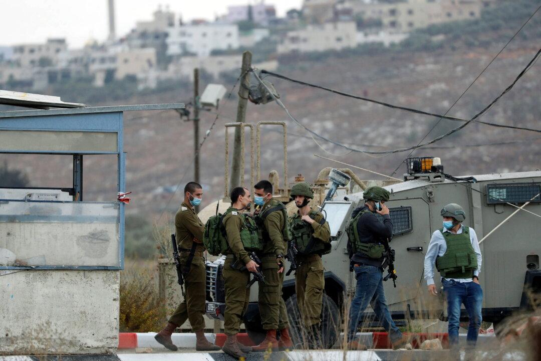 Palestinian Officer Fires at Israeli Troops and Is Shot Dead, Army Says