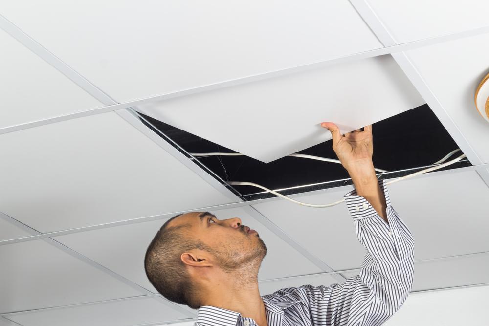 Cover and Hide Ceiling Damage With a Dropped Ceiling