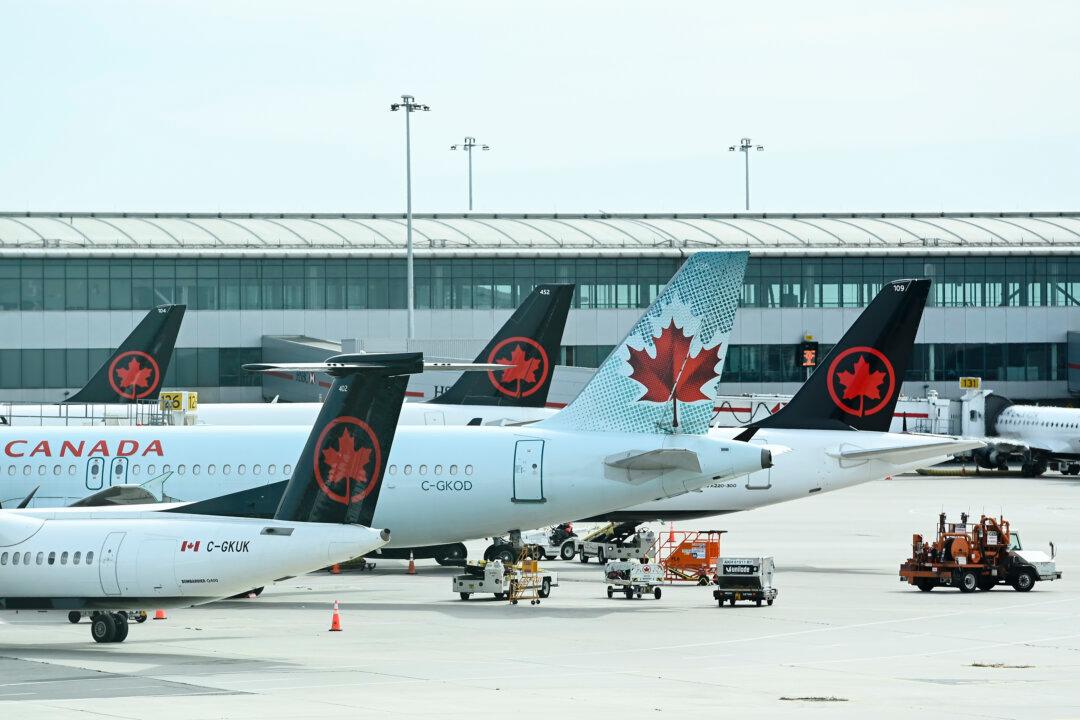 Air Canada Reports $685M Third Quarter Loss Compared With $636M Profit a Year Ago