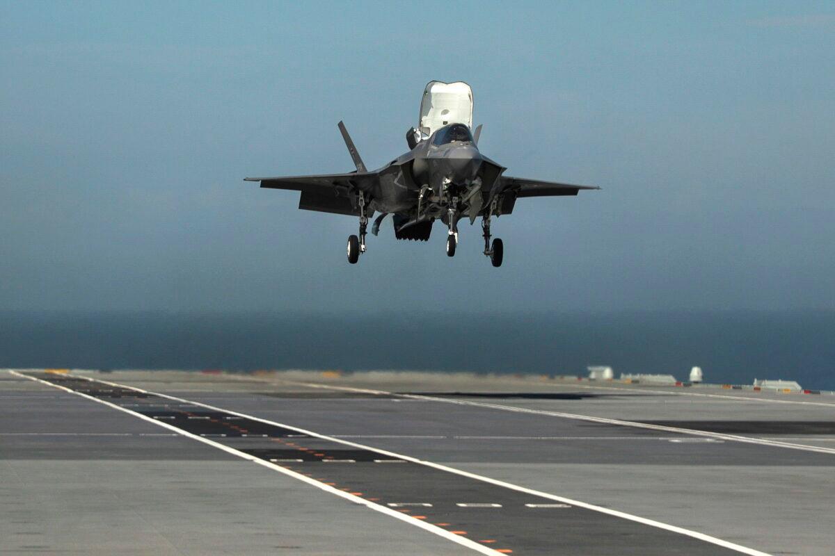 An F-35B lands onboard HMS Queen Elizabeth in Portsmouth, England, on Sept. 26, 2018. (PO Arron Hoare/Ministry of Defence via Getty Images)