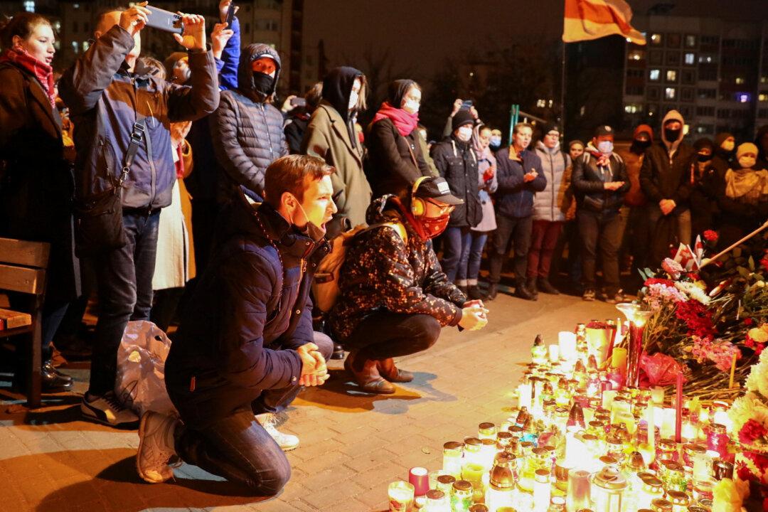 Candles and Condemnation as Thousands Mourn Death of Belarus Protester
