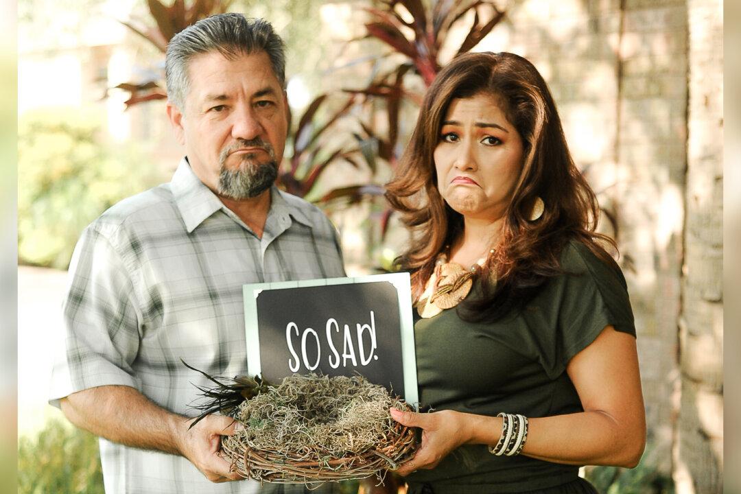 Mom and Dad Stage Witty Photoshoot Celebrating ‘Empty Nest’ as Their Kids Move Out