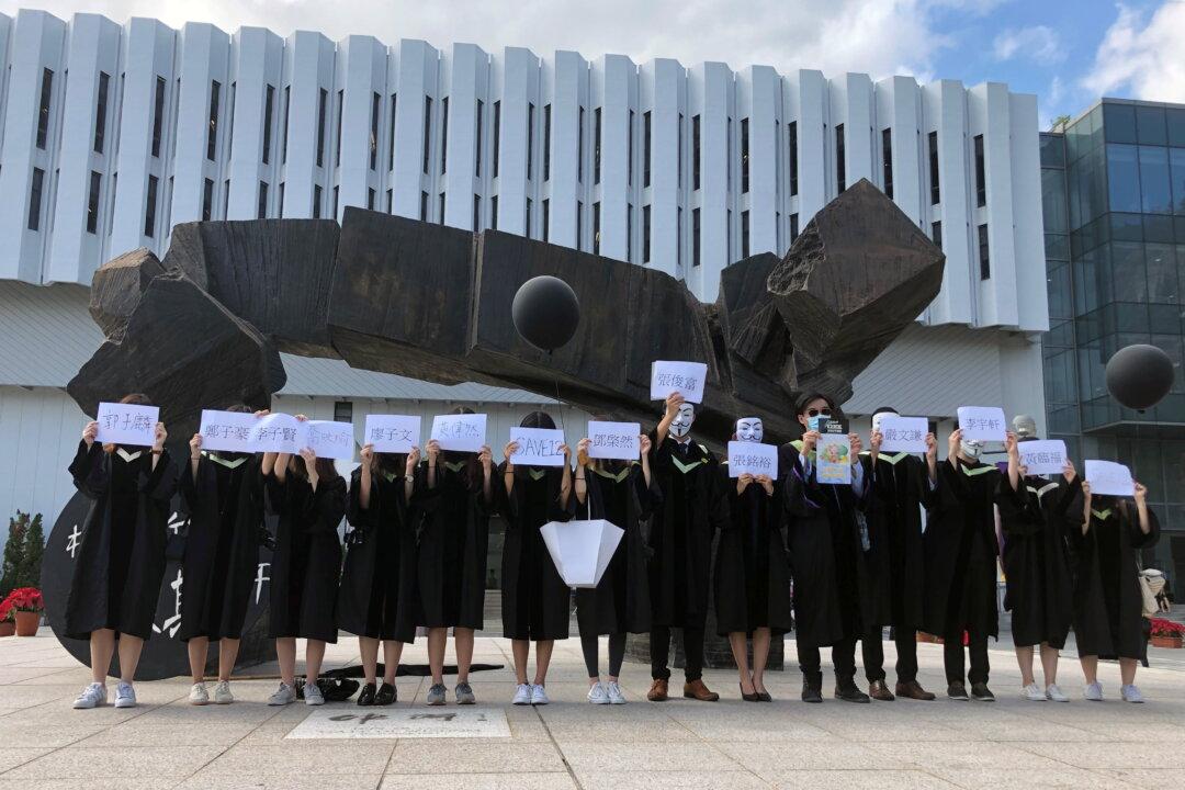 Campus March by Hong Kong Graduates Marks a Year Since University Clashes