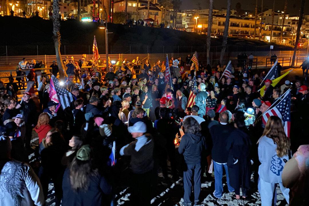 Hundreds Protest Curfew in Huntington Beach and San Clemente