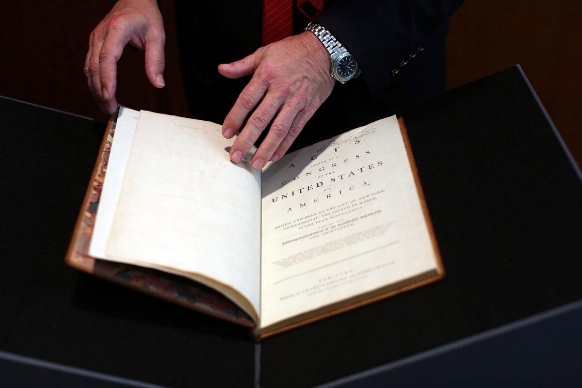 A copy of former President George Washington's personal copy of the U.S. Constitution and Bill of Rights is viewed at Christie's auction house on June 15, 2012. (Spencer Platt/Getty Images)