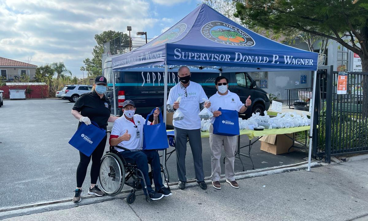 Groups Hand Out Thanksgiving Meals, Food to Struggling Orange County Families