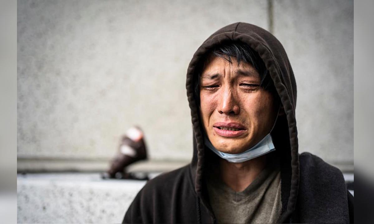 Portrait of Young Homeless Man Crying Attracts 3 Strangers to Find Him, Drive Him Home to Wisconsin