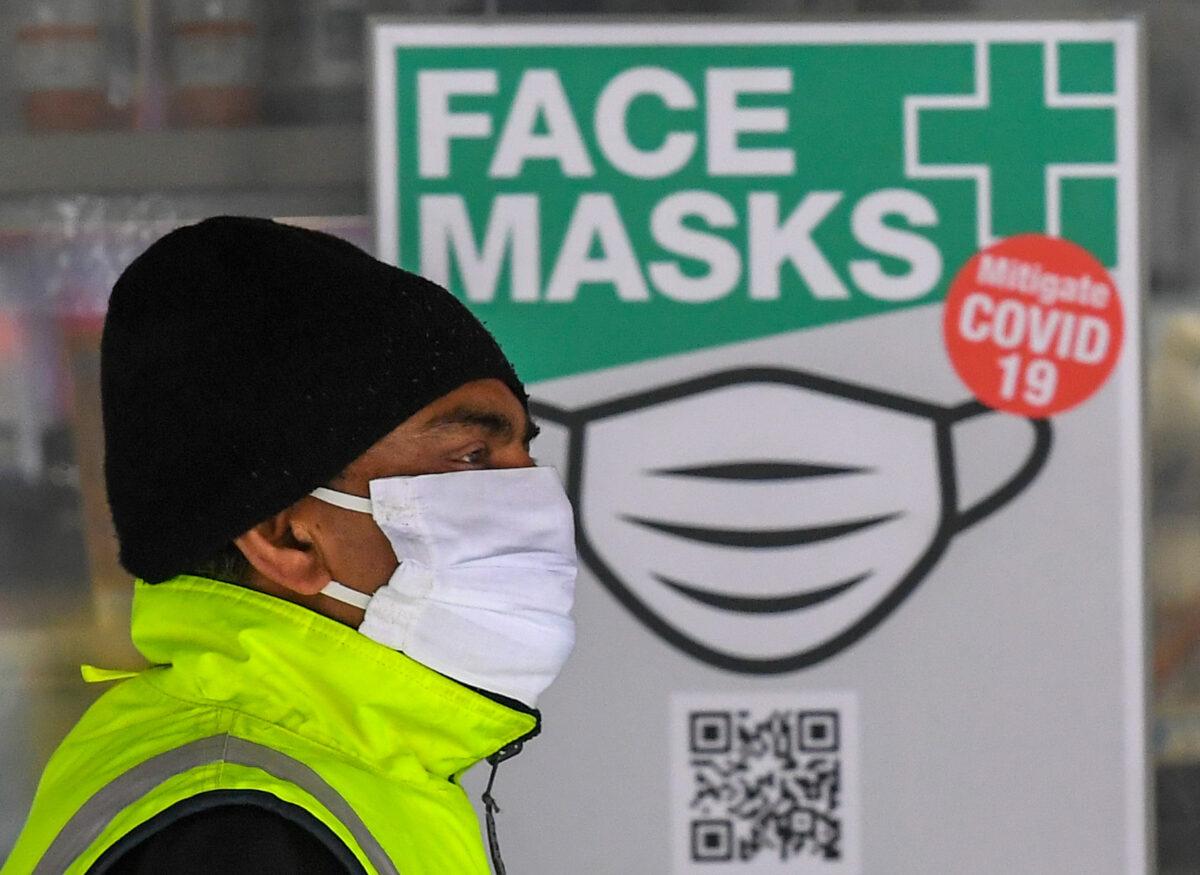 An unidentified individual wears a mask in Melbourne, Australia, on July 20, 2020. (William West/AFP via Getty Images)