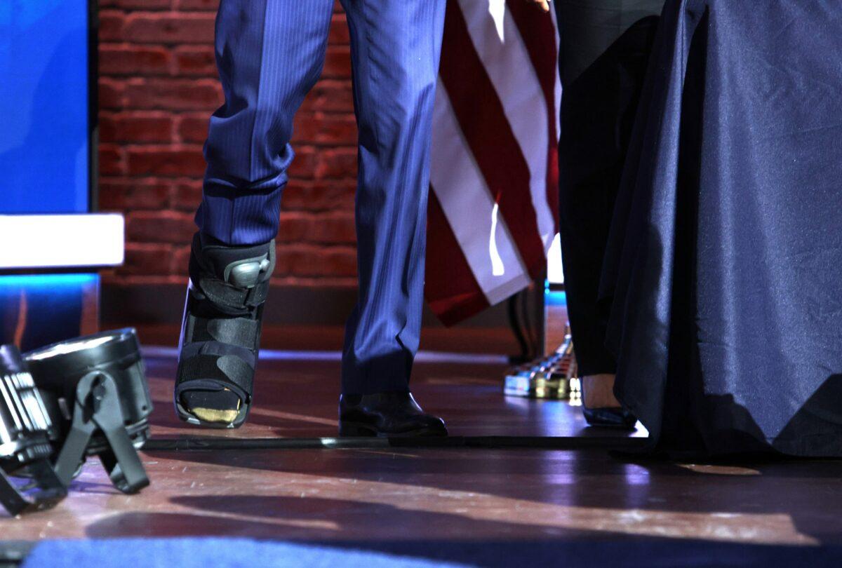 Democratic presidential candidate Joe Biden wears a walking boot during an event at the Queen Theater in Wilmington, Del., on Dec. 1, 2020. (Alex Wong/Getty Images)