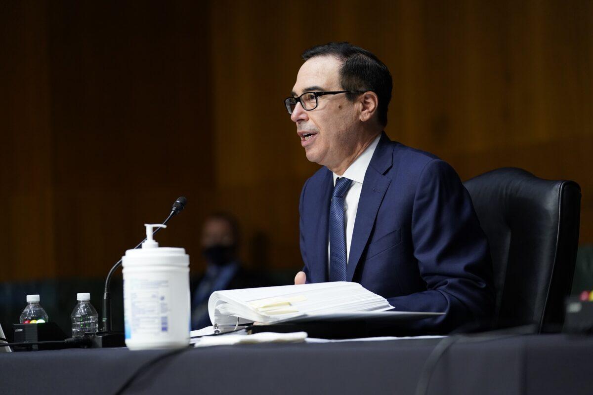 Treasury Secretary Steven Mnuchin testifies during a Senate Banking Committee hearing about the quarterly CARES Act report on Capitol Hill in Washington on Dec. 1, 2020. (Susan Walsh/Pool/Getty Images)
