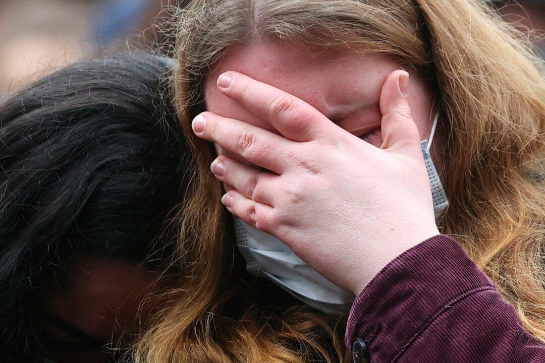 Tearful Mourners Hold Vigil in German City After Drunk Man Kills Five