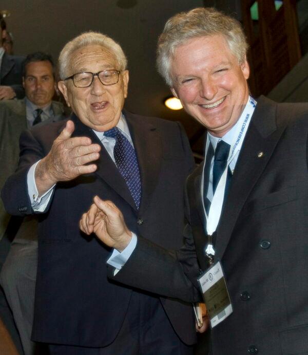 Former U.S. Secretary of State Henry Kissinger (L) and Power Corp. Co-Chairman Paul Desmarais Jr., since retired, arrive at the International Economic Forum of the Americas in Montreal on June 11, 2008. (The Canadian Press/Ryan Remiorz)