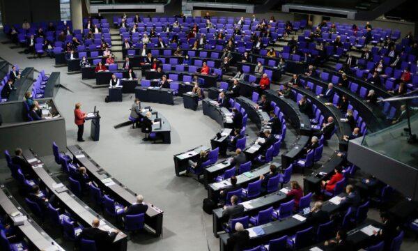 German Chancellor Angela Merkel delivers her speech during the debate about Germany's budget 2021, at the parliament Bundestag in Berlin, on Dec. 9, 2020. (Markus Schreiber/AP Photo)