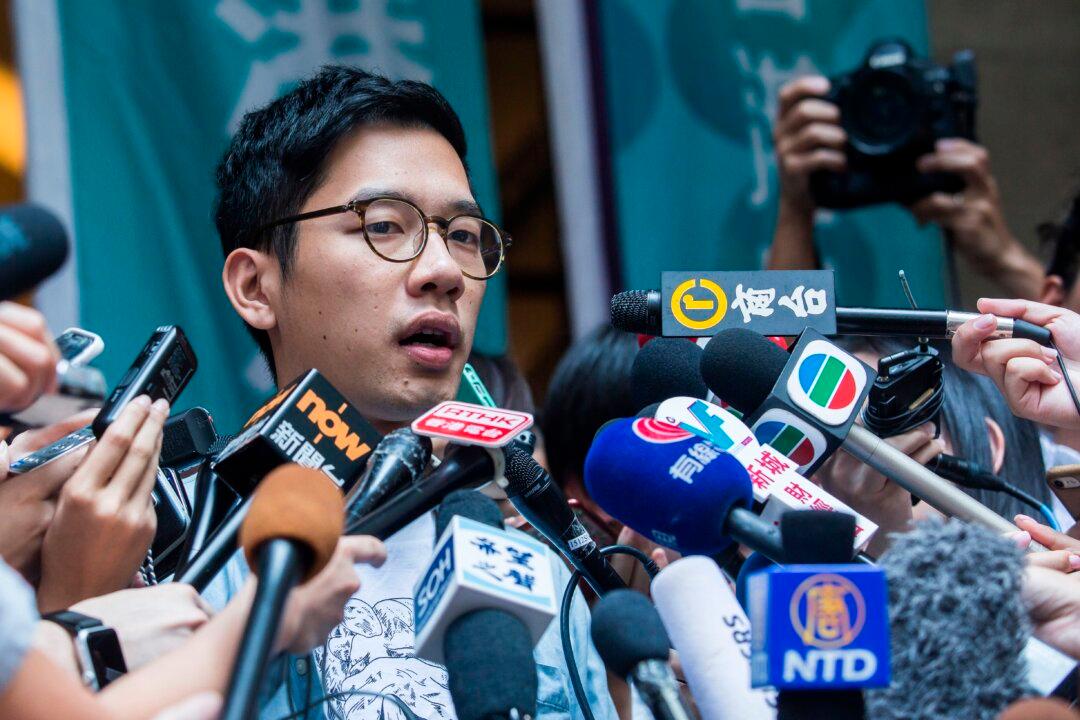 Democracy Activist Urges Hong Kong Voters to Ignore Dec. 19 Election