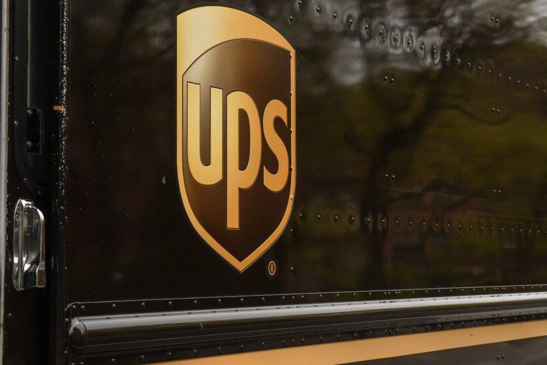 UPS Driver Dies After Assault; Search Underway for Suspect