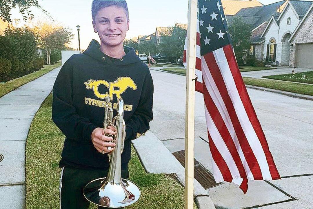 Teen Honors Fallen Marine by Playing Patriotic Hymns Outside Home for 2 Weeks